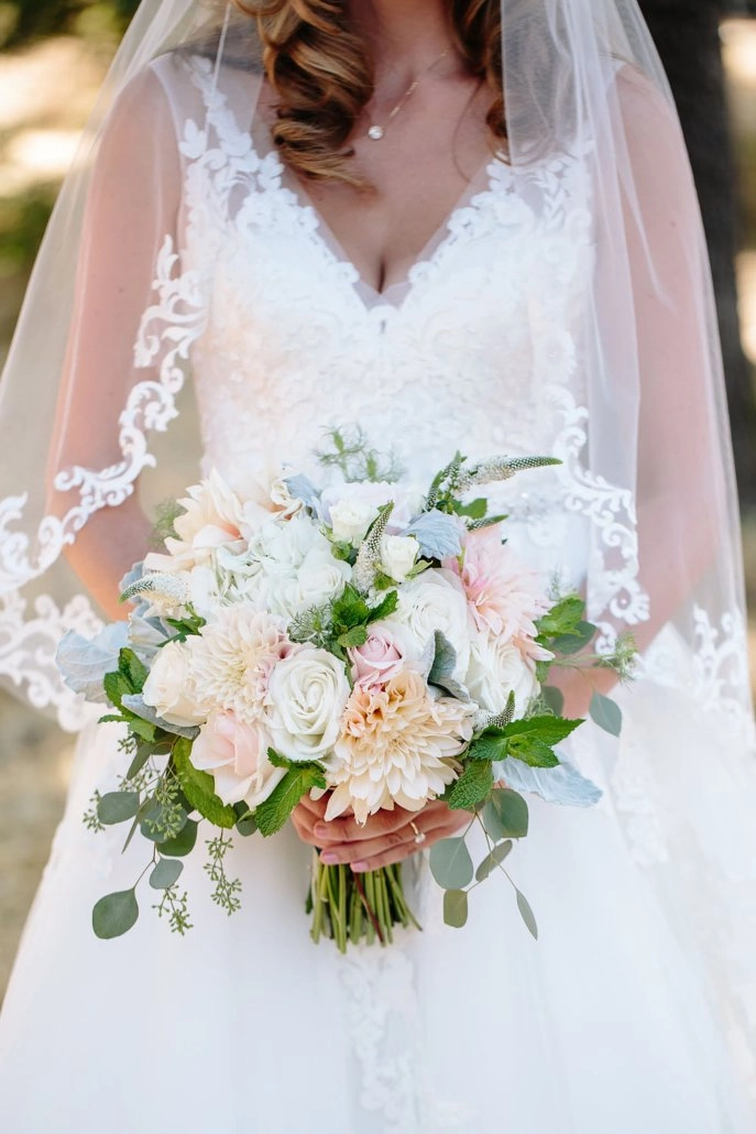 Bridal bouquet with blush roses and dahlias