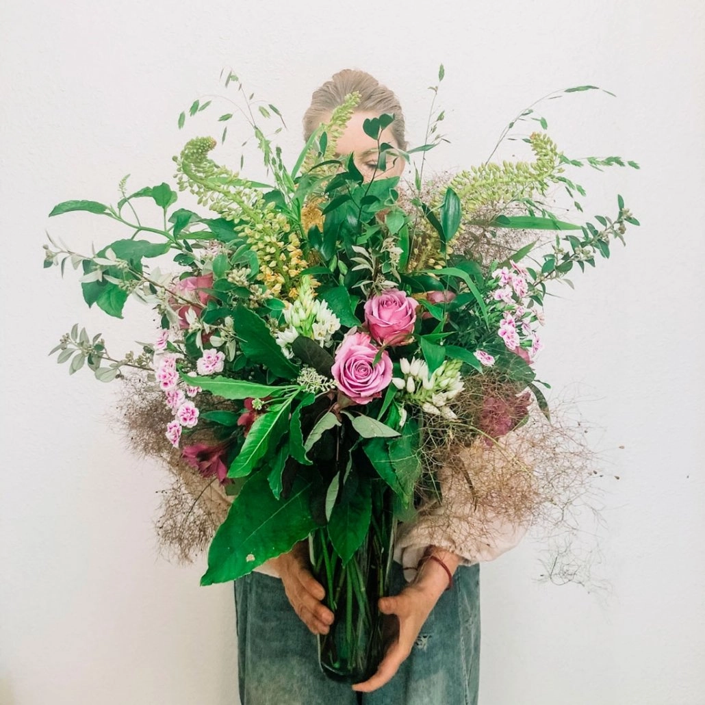 Designer holding garden bouquet