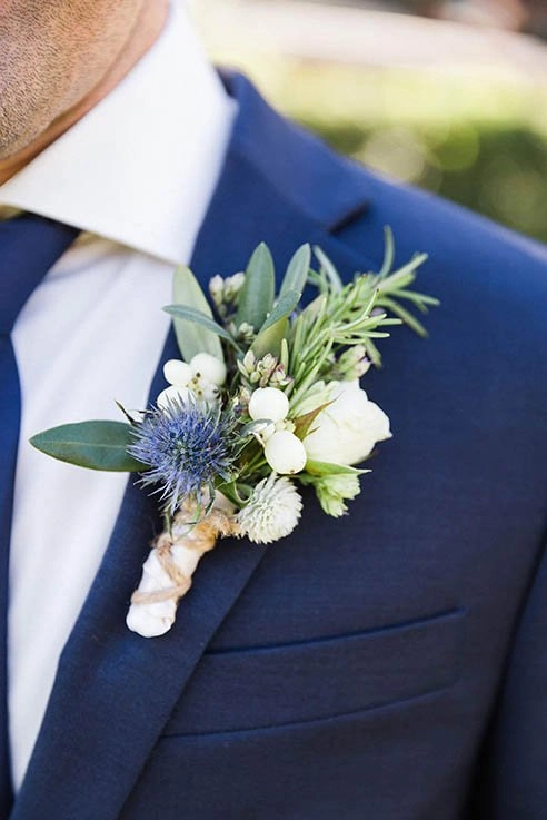 Thistle and olive boutonnière